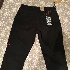 Ksubi Black Relaxed Fit Pants with Red Accents